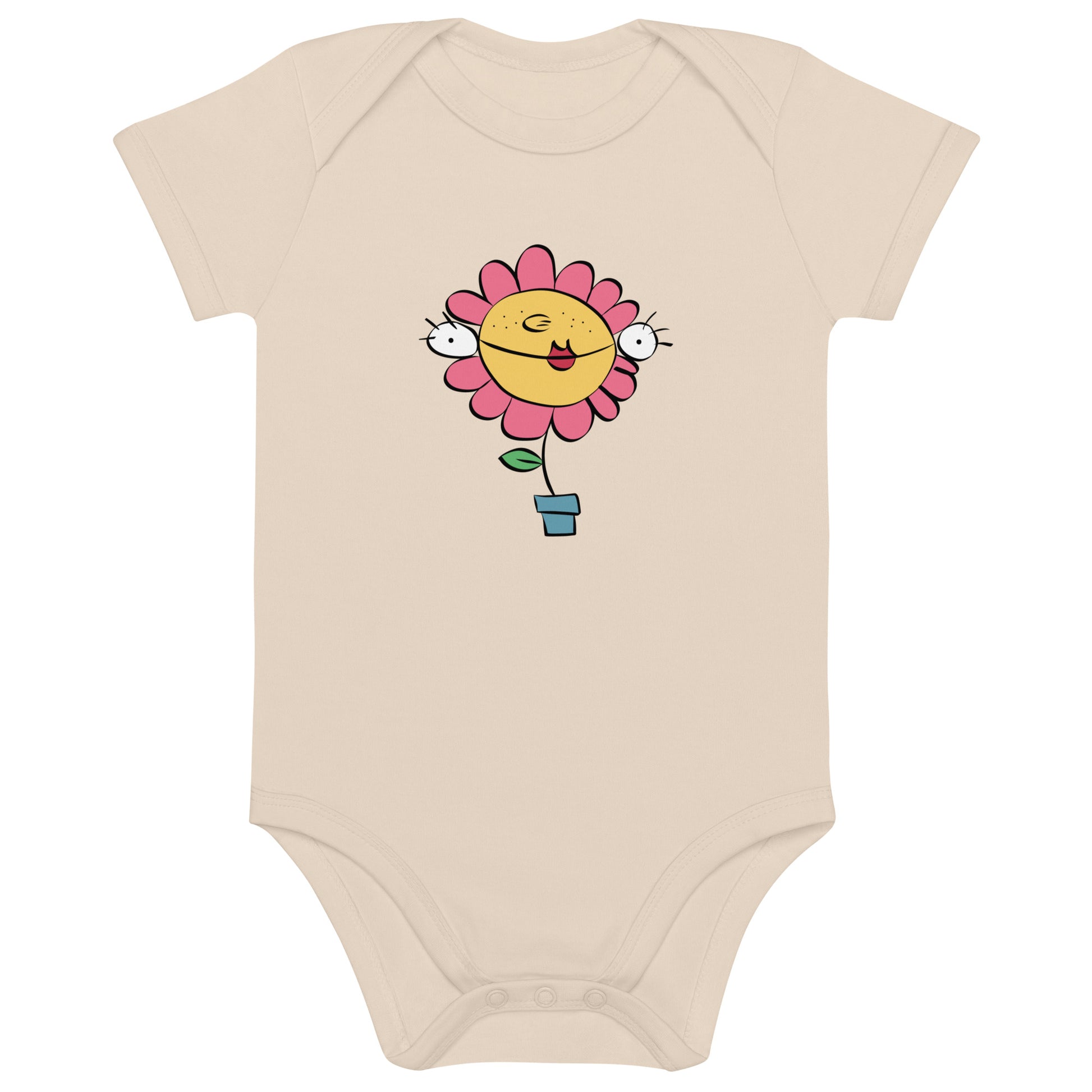 Estampado del personaje Florette sobre body de bebé color natural y elaborado con algodón orgánico certificado. Manga corta.