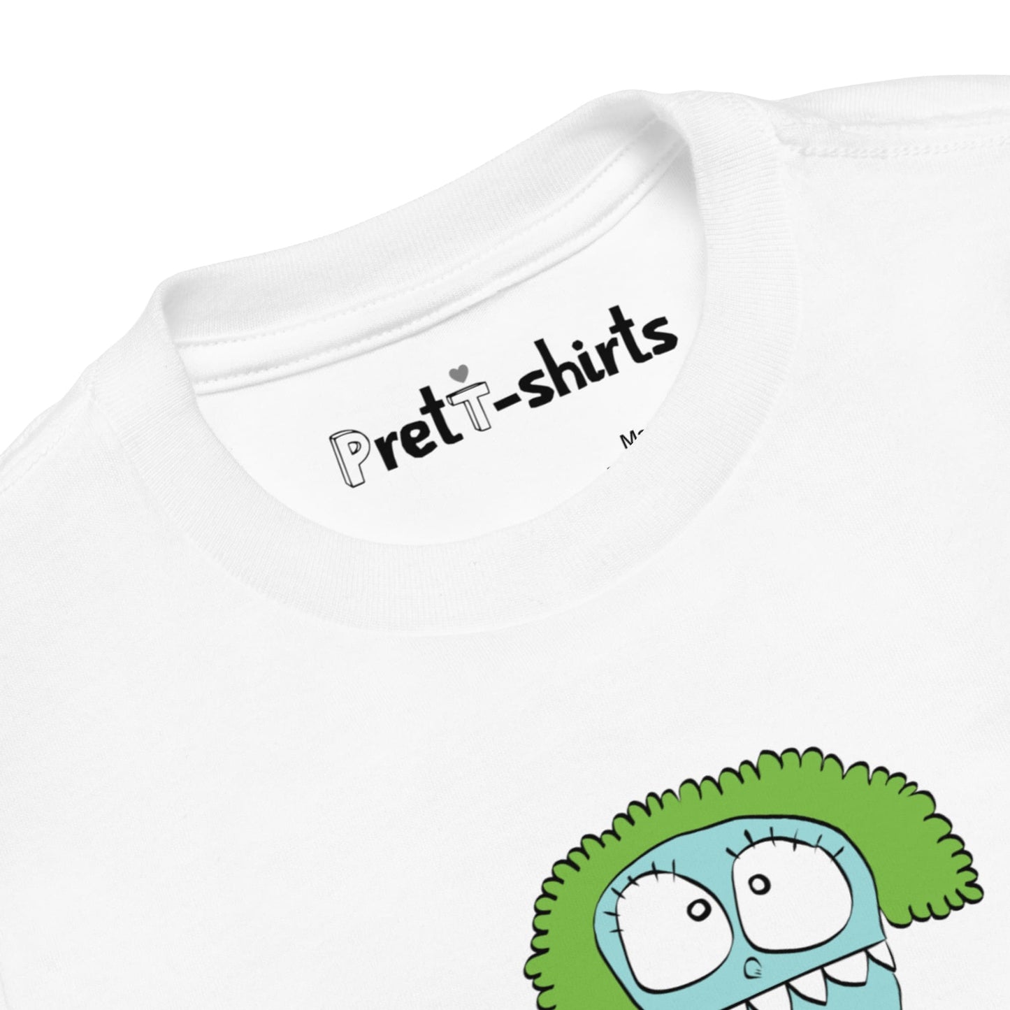 Detalle del cuello y etiqueta interior de la camiseta blanca de algodón orgánico certificado. Mr. Brocolius.